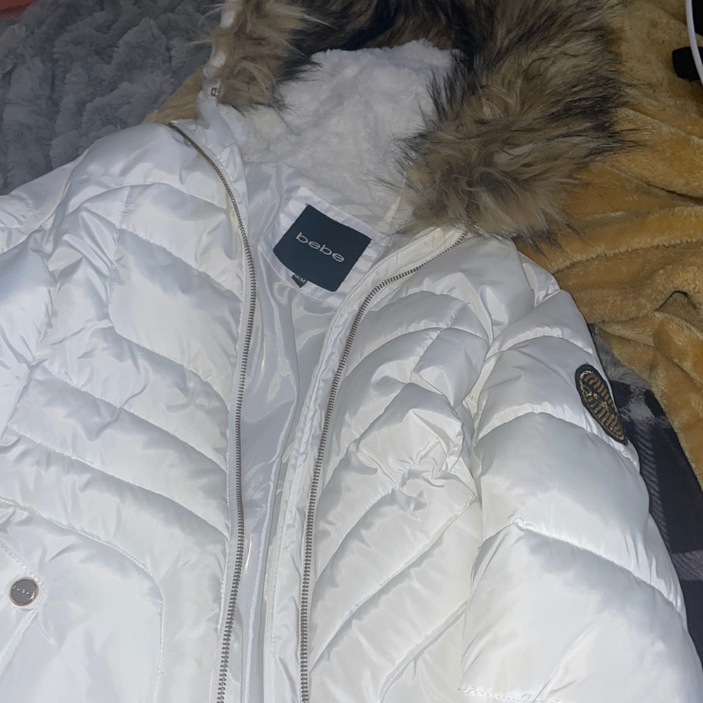 Bebe white coat with fur coat, it reminds me of the 200s